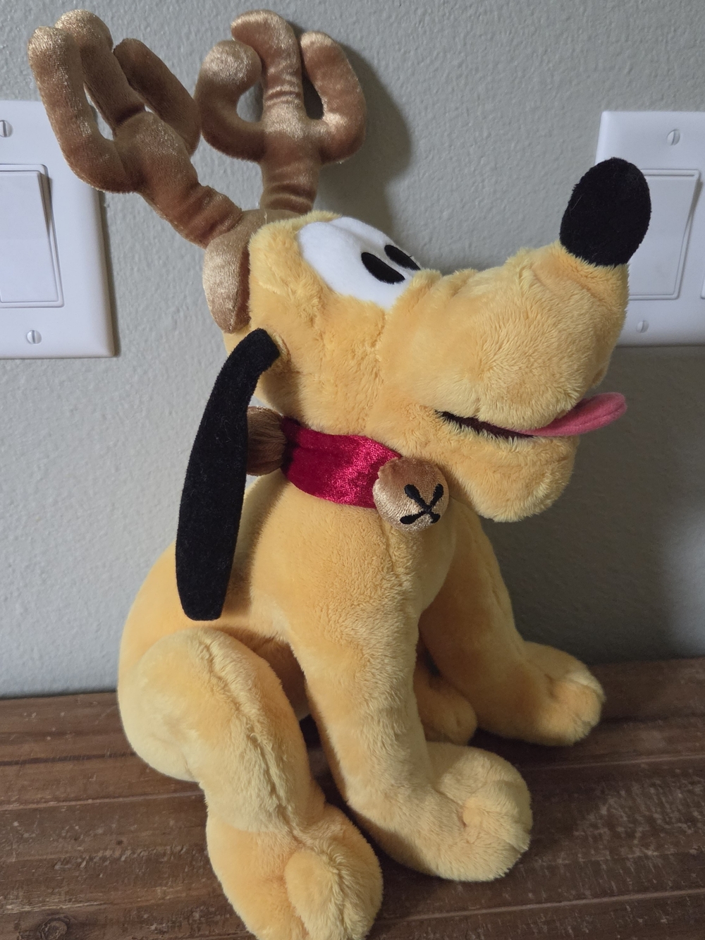 vintage Disney Store Exclusive Reindeer Pluto Plush featuring soft golden-yellow